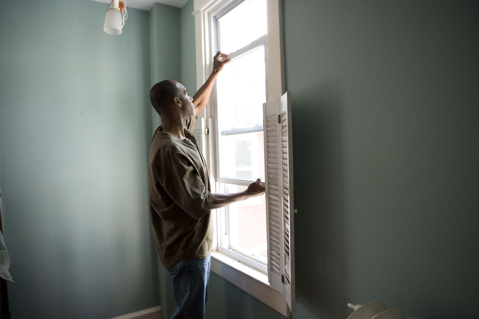 person checking window